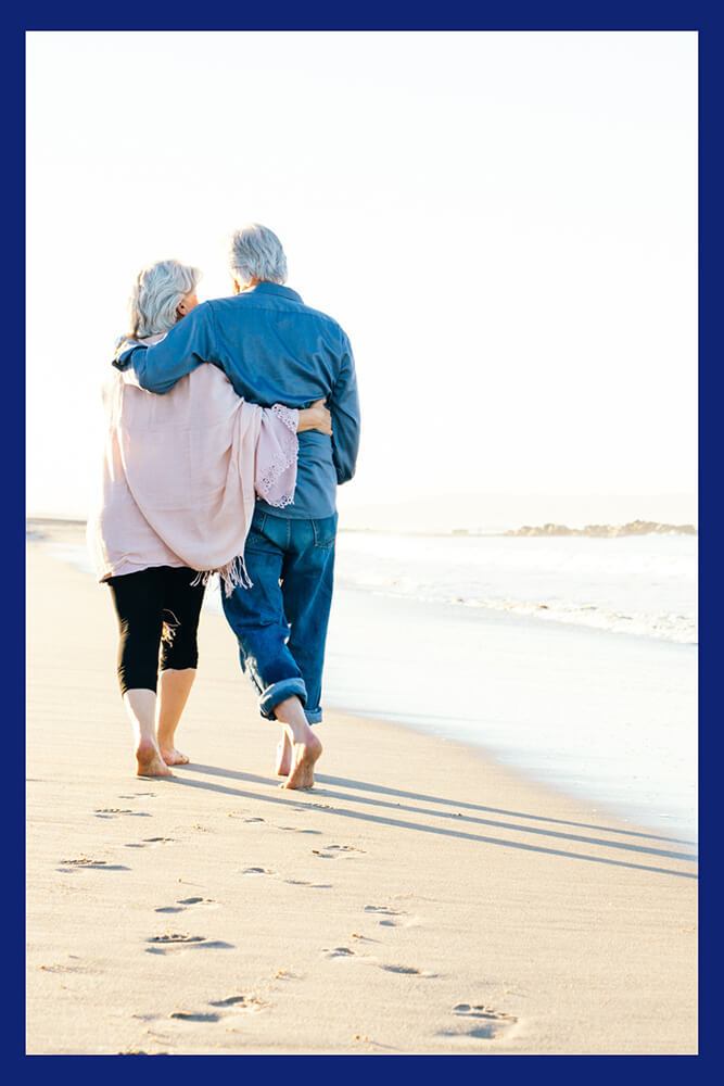 couple-hugging-on-beach